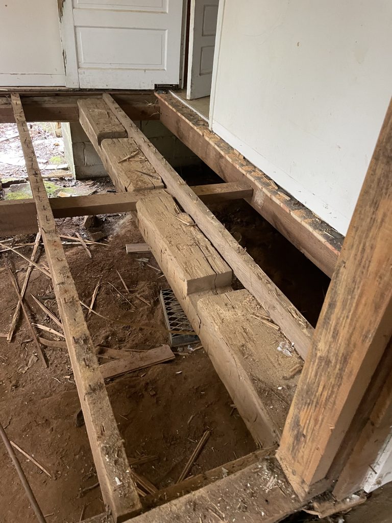 hand hewn log used as a floor joist on an old 1890's upstate SC home.
