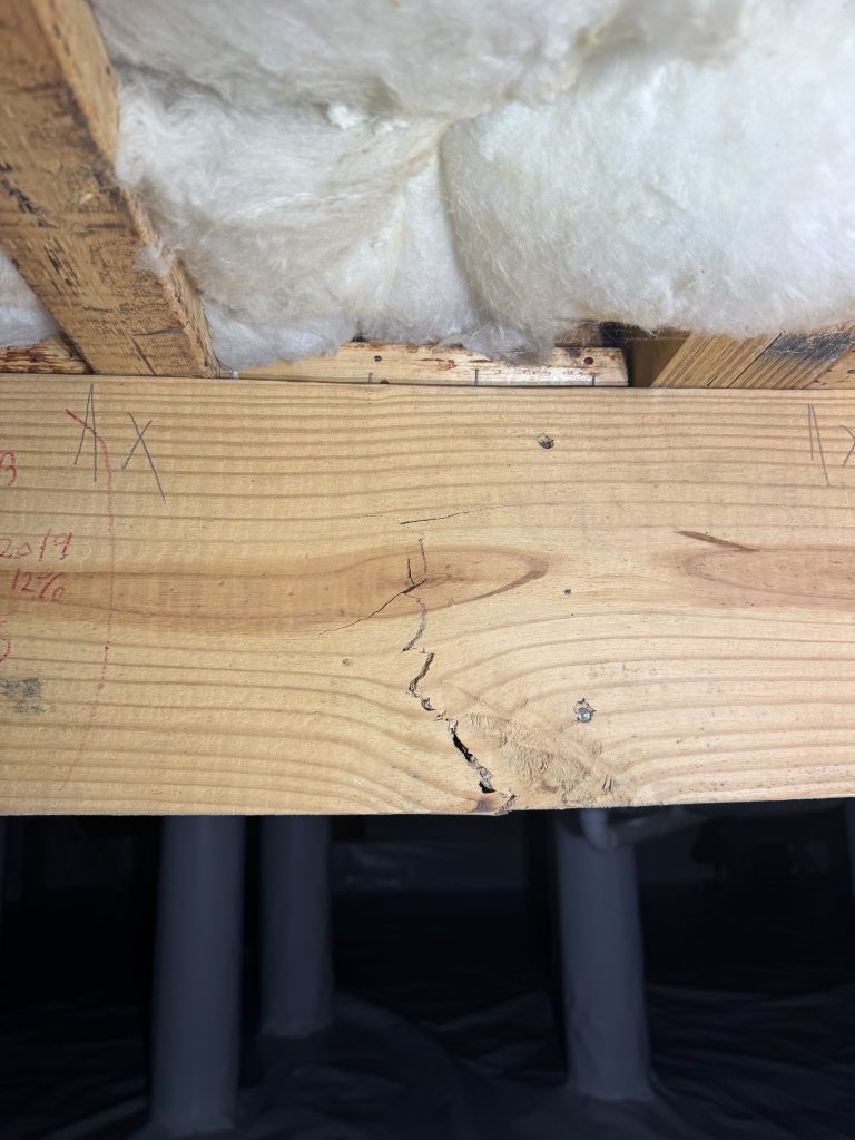 girder cracked under load.
