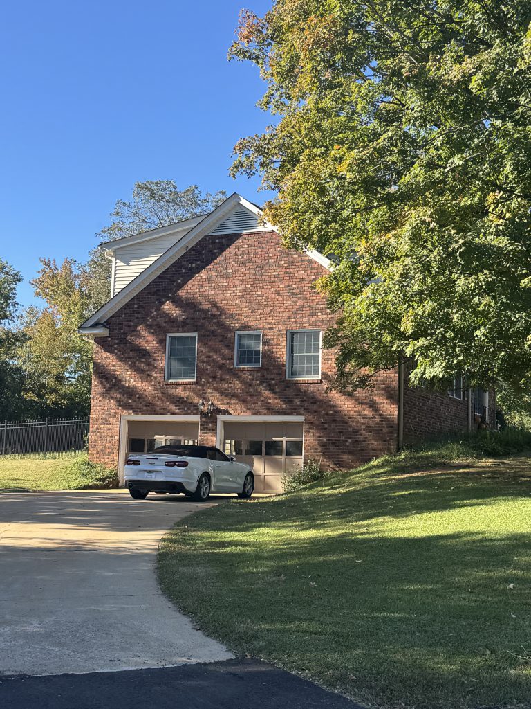 A ranch with a tuck under garage due to a slopped lot in Greer SC